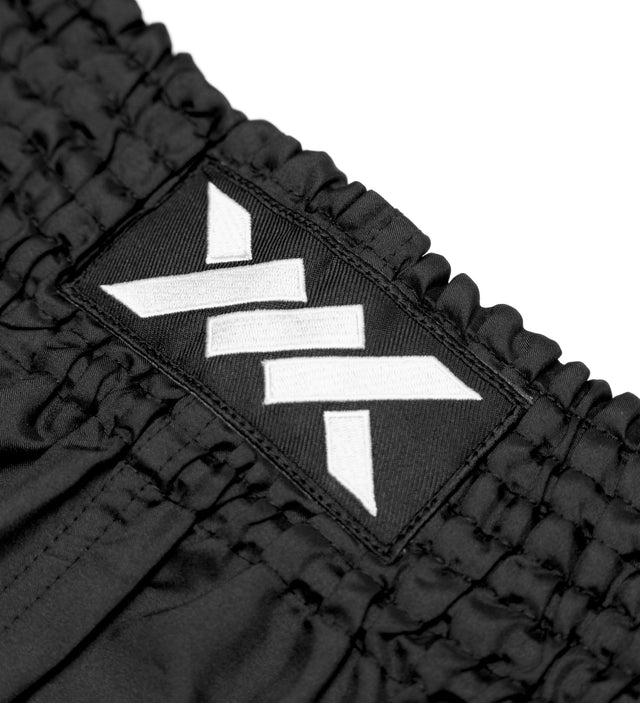 Caged Muay Thai Shorts Classic - Schwarz/Weiss