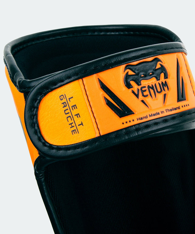 Venum Schienbeinschoner Elite Kinder – Neonorange