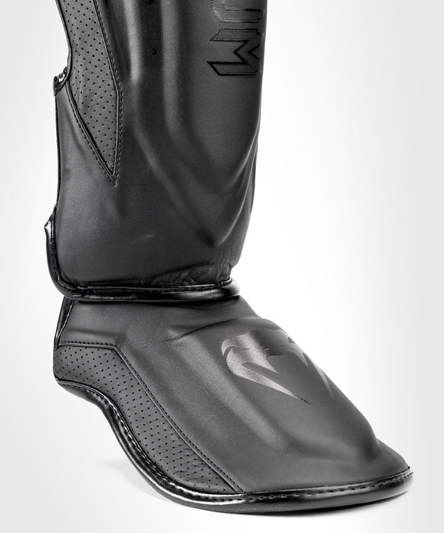 Venum Schienbeinschoner Elite Evo - Schwarz/Schwarz