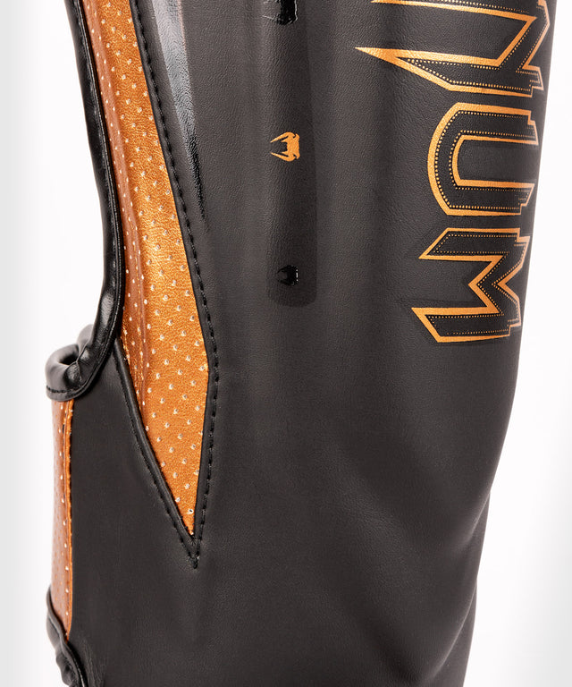Venum Schienbeinschoner Elite Evo - Schwarz/Bronze