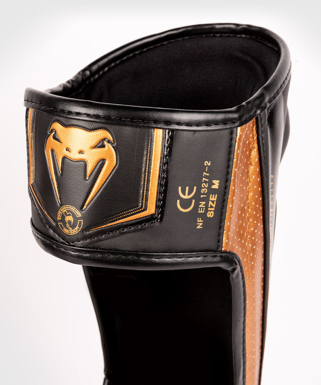 Venum Schienbeinschoner Elite Evo - Schwarz/Bronze