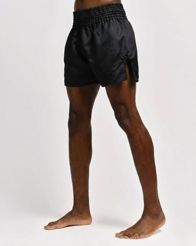 Caged Muay Thai Shorts Classic – Schwarz/Schwarz
