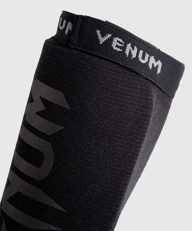 Venum Schienbeinschoner Kontact - Schwarz/Schwarz