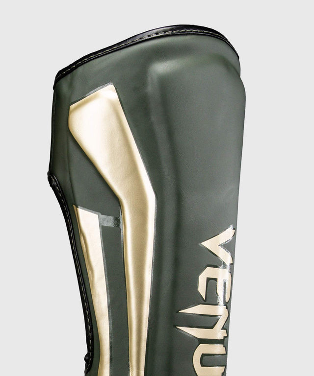 Venum Schienbeinschoner Elite – Khaki-Grün/Gold