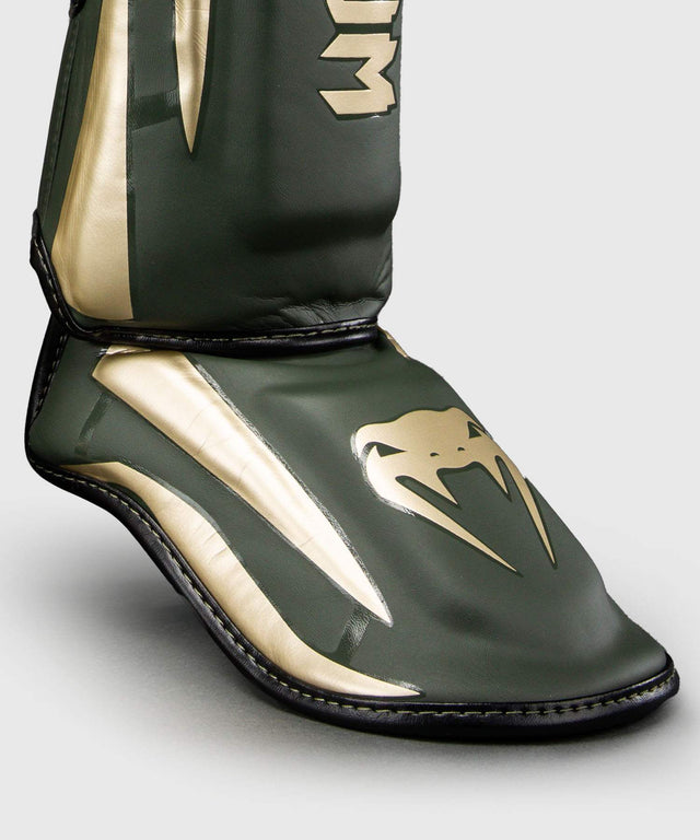 Venum Schienbeinschoner Elite – Khaki-Grün/Gold