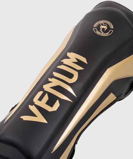 Venum Schienbeinschoner Elite - Schwarz/Gold