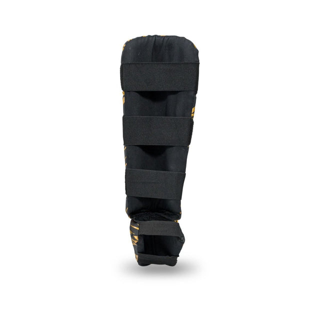 Booster Schienbeinschoner Kids Combat – Schwarz/Gelb